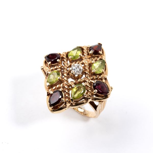 Anello in oro con diamanti, granati e peridoti