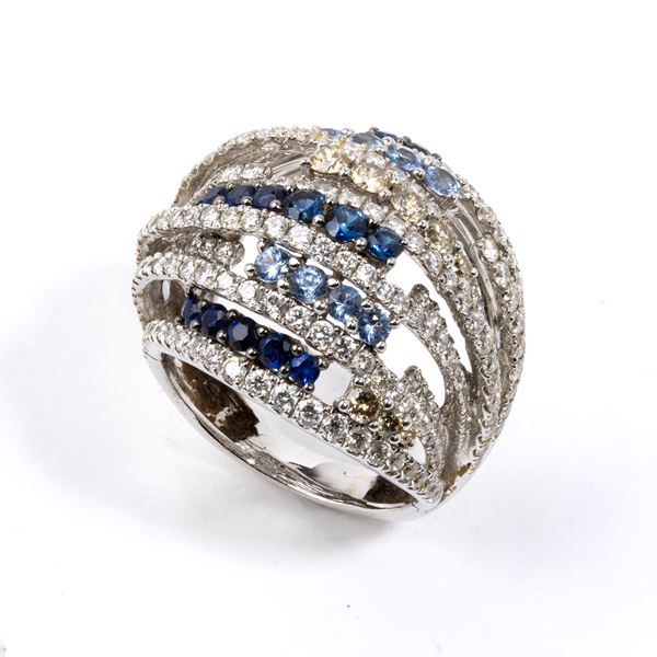 Anello a fascia in oro con diamanti e zaffiri