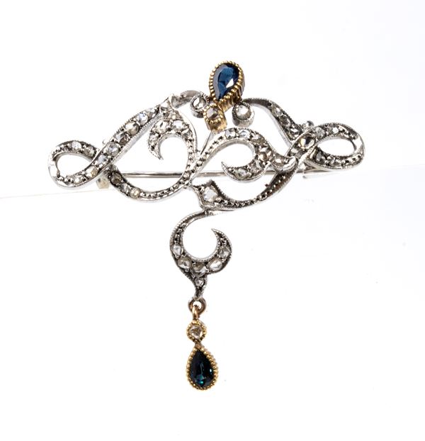 Spilla in oro con zaffiri e diamanti