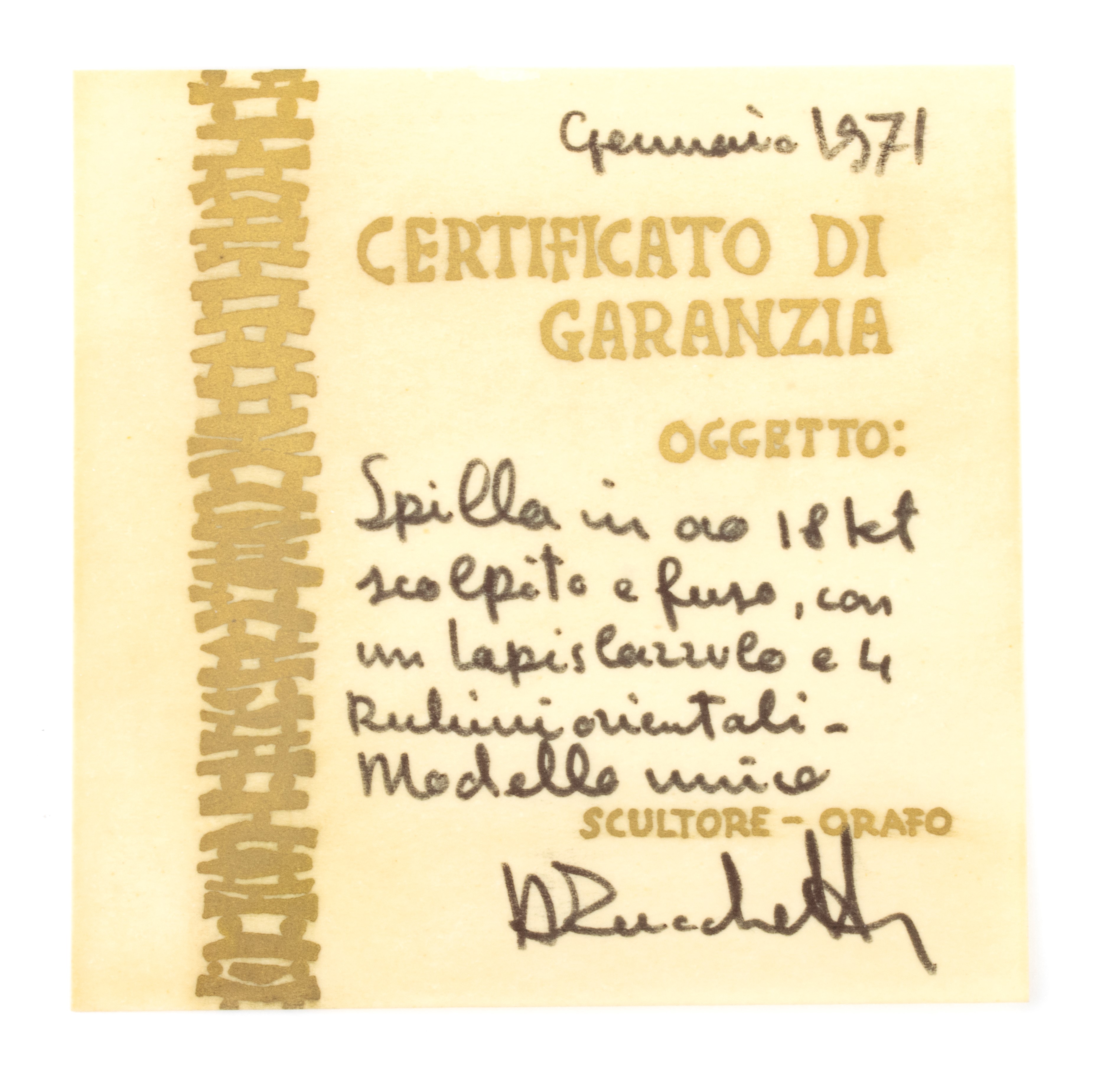 Spilla in oro con lapislazzuli e rubini