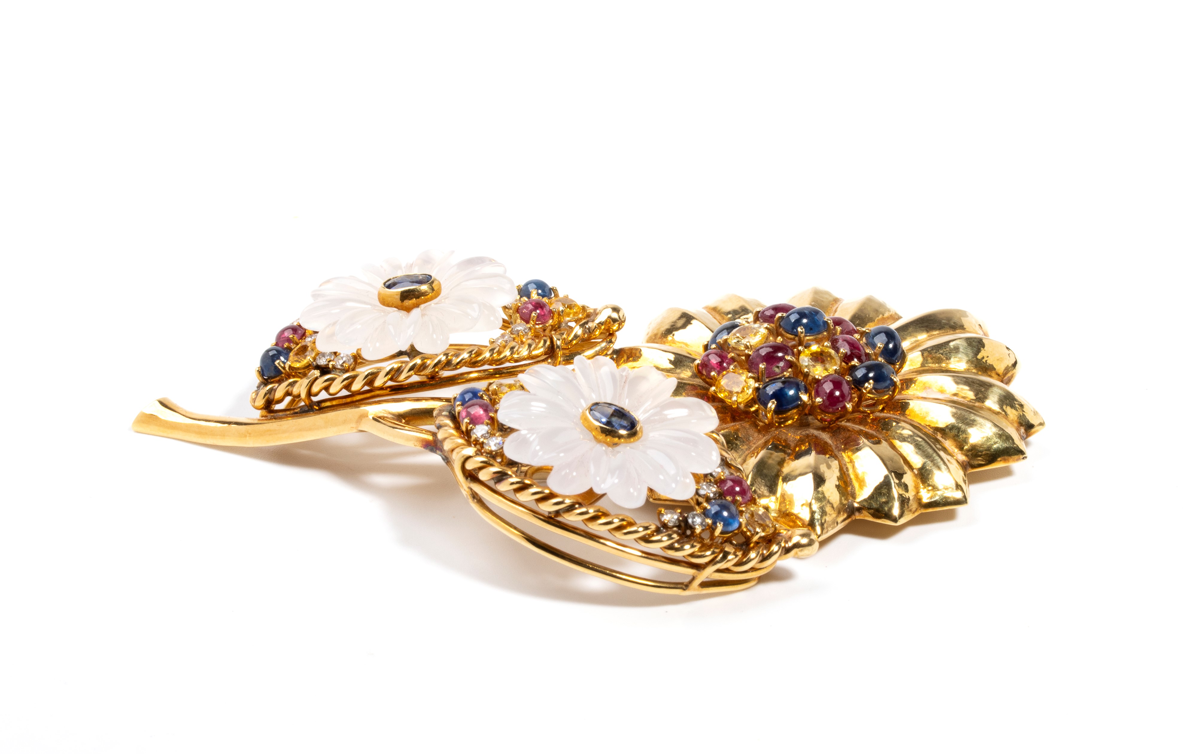 Spilla in oro con pietre preziose