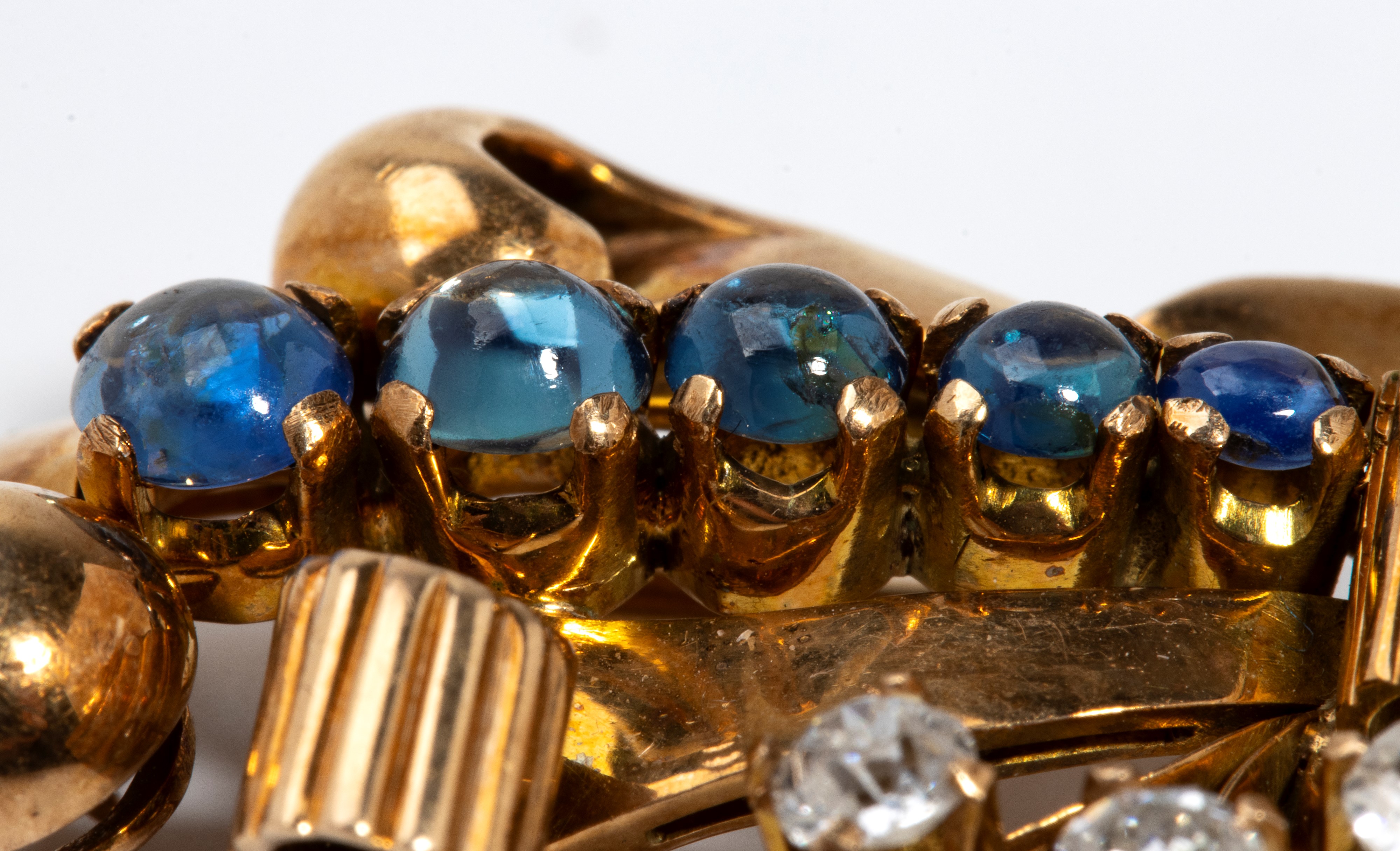 Spilla in oro giallo 18k con zaffiri e diamanti, anni ’30