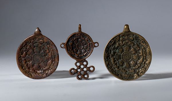 lot of three copper alloy Jiu Gong Ba Gua amulets. Tibet, 19th century.