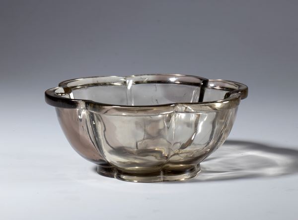 A smoky quartz bowl in the shape of a begonia flower. China, 19th century