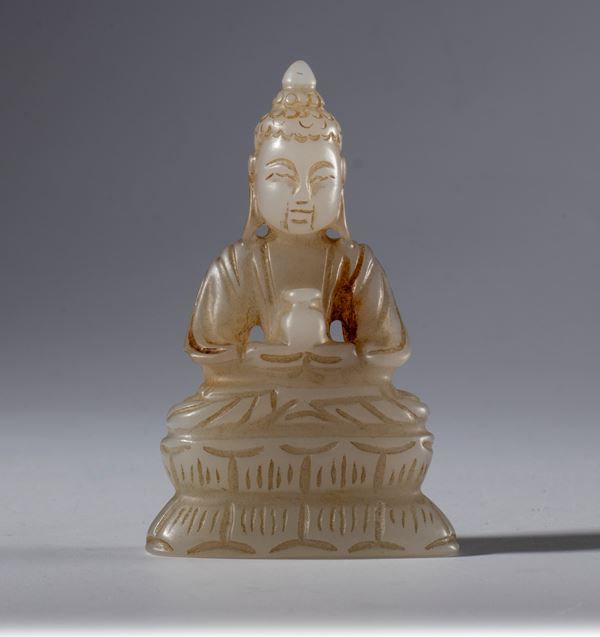 A white Hotan jade Buddha statue. China, 19th century.