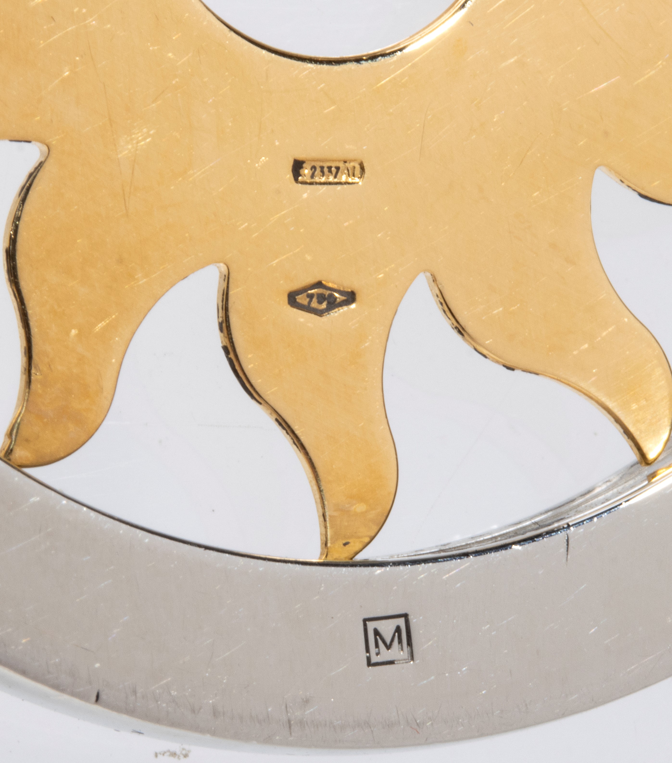 Collezione TONDO: girocollo con pendente sole in oro e acciaio