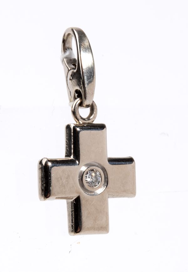 CARTIER - Pendente croce in oro con diamante