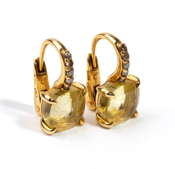 “Nudo” Collection: pair of gold earrings with citrine quartz