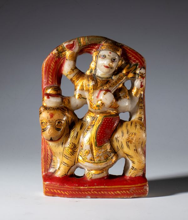 Carved, painted, and partially gilded alabaster stele depicting the goddess Durga. India, Rajasthan, 19th century.