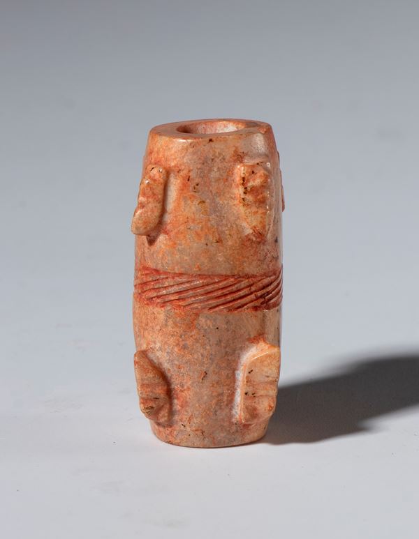 A tubular nephrite jade pendant with eight cicada-shaped elements on the edges. China