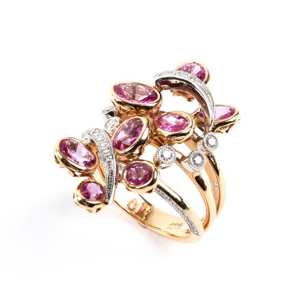 Anello in oro con corindoni rosa e diamanti