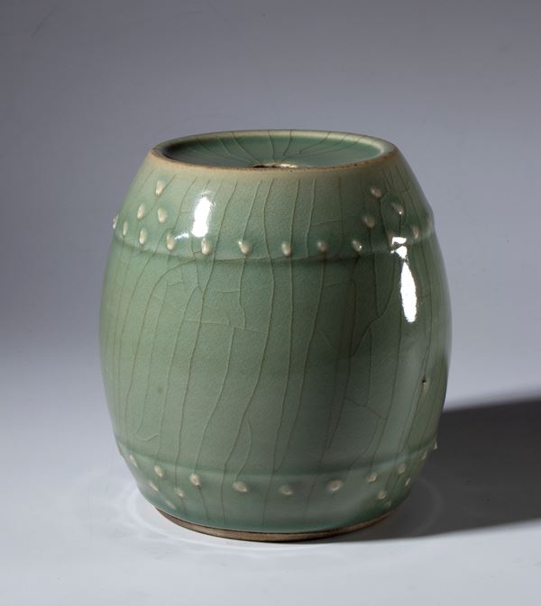 A drum-shaped celadon-glazed ceramic vase. China, 20th century.