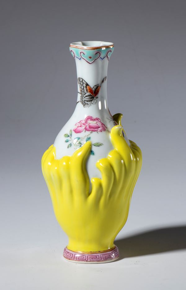 Porcelain vase painted with flowers and butterflies. The body of the vase is meant to resemble the fruit of the "Buddha's Hand" lemon tree. China, 19th century