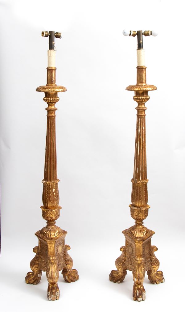 Pair of gilded wooden candlesticks