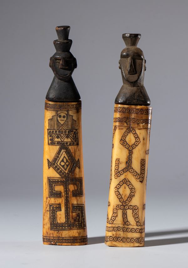 Pair of bone and wood containers for medicinal/magical substances from the Dayak shamans of Borneo. Malay Archipelago, 19th century.