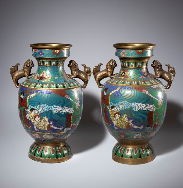 A pair of two-handled copper alloy vases with cloisonné enamels. China, 20th century.