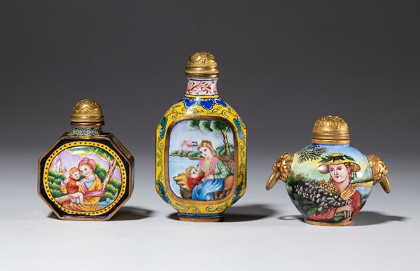 A lot of three copper and polychrome enamel snuff bottles. China, early 20th century.