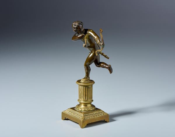 Cupido. Barthelemy Prieur (1535-1611) Scuola di. Probabilmente XVII secolo. Bronzo con patina rossastra trasparente, tracce di patina artificiale nera
