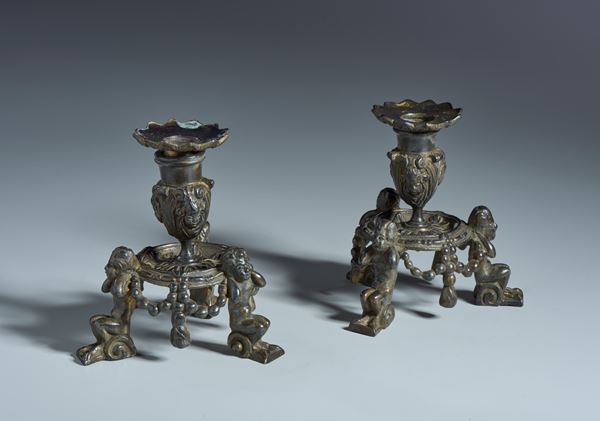 Coppia di candelieri. Niccolò Roccatagliata (1560 - 1636 ) Scuola di. XVI-XVII sec. Bronzo patina nera 