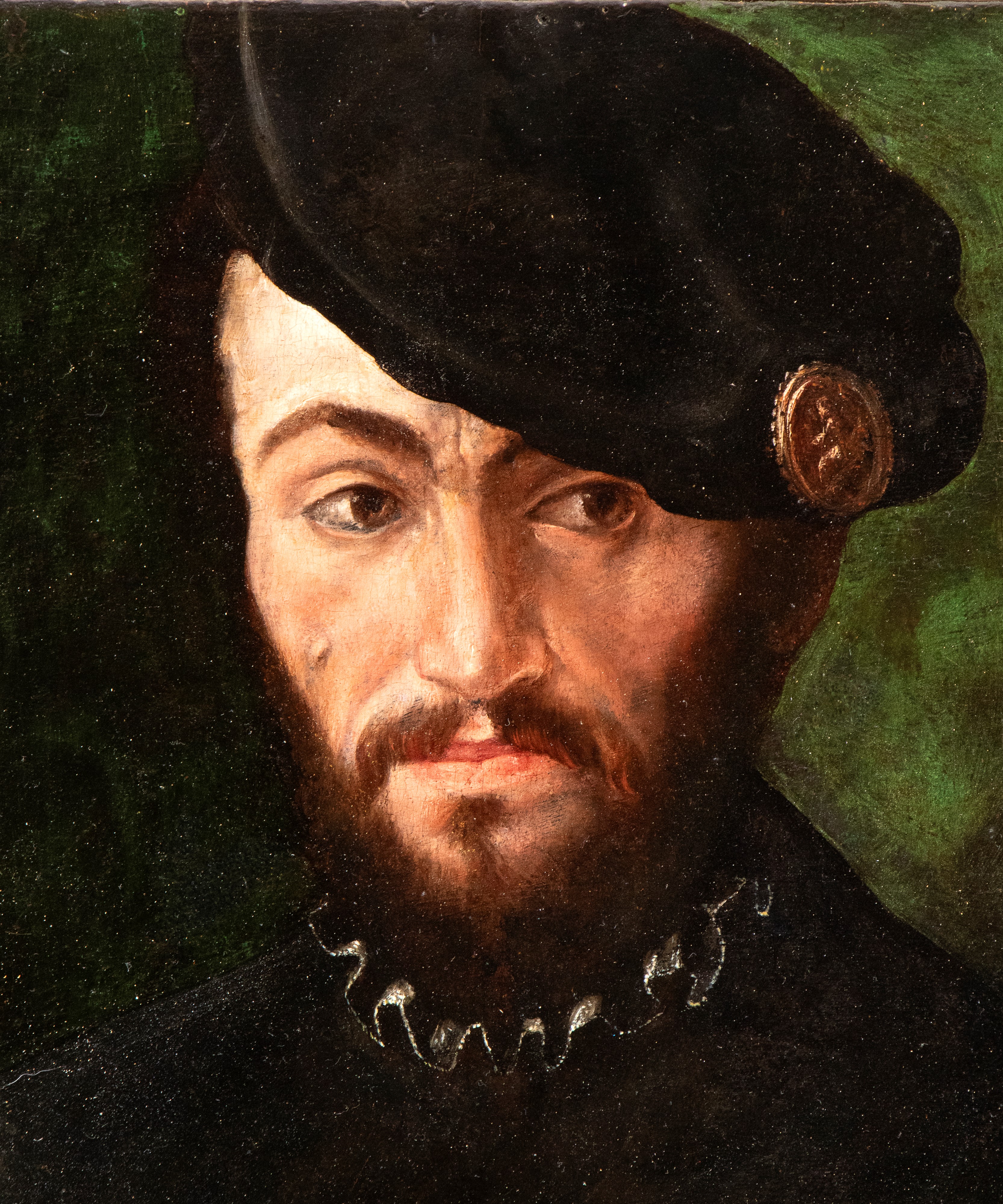 Ritratto di gentiluomo in nero con berretto