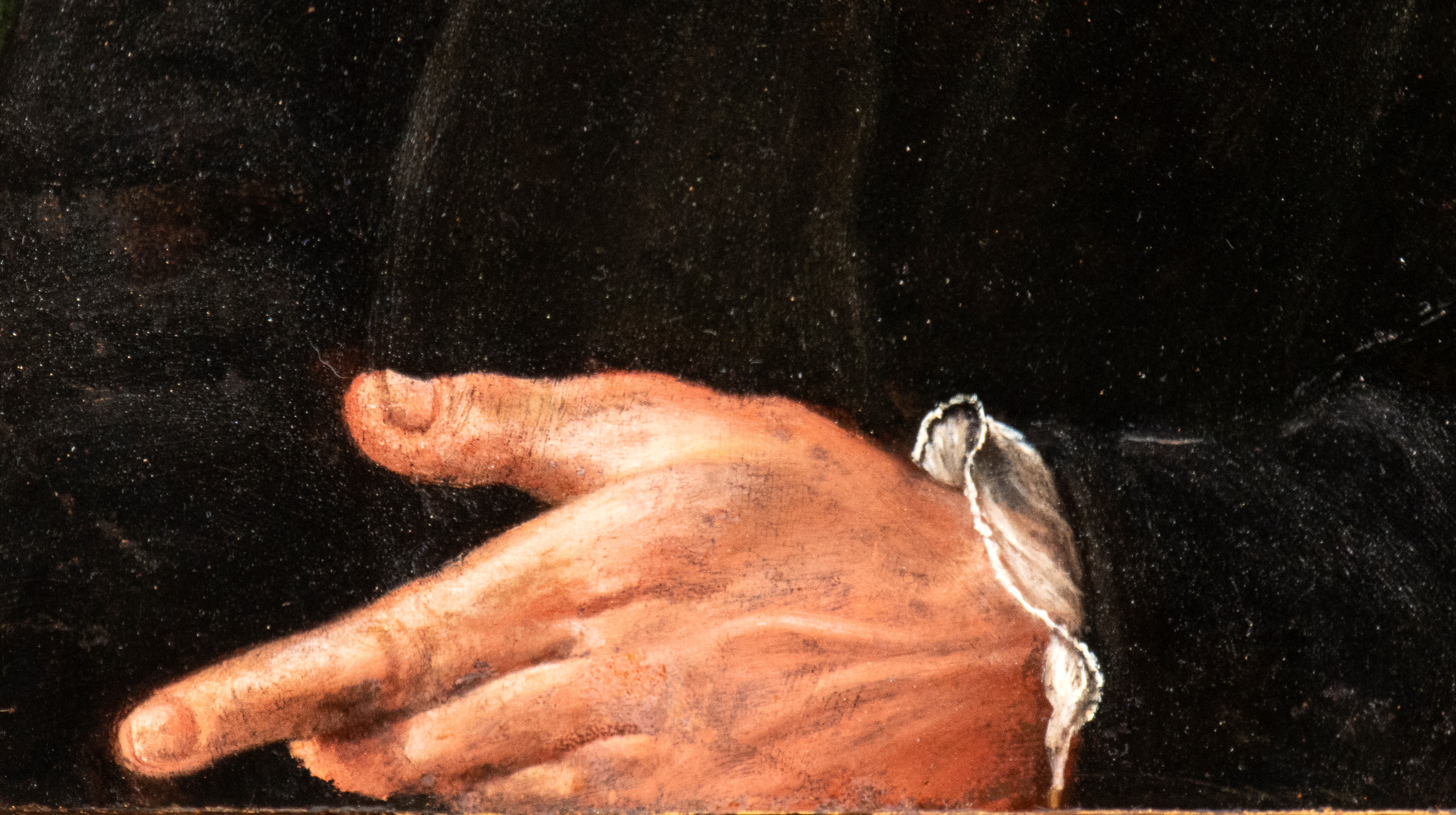 Ritratto di gentiluomo in nero con berretto