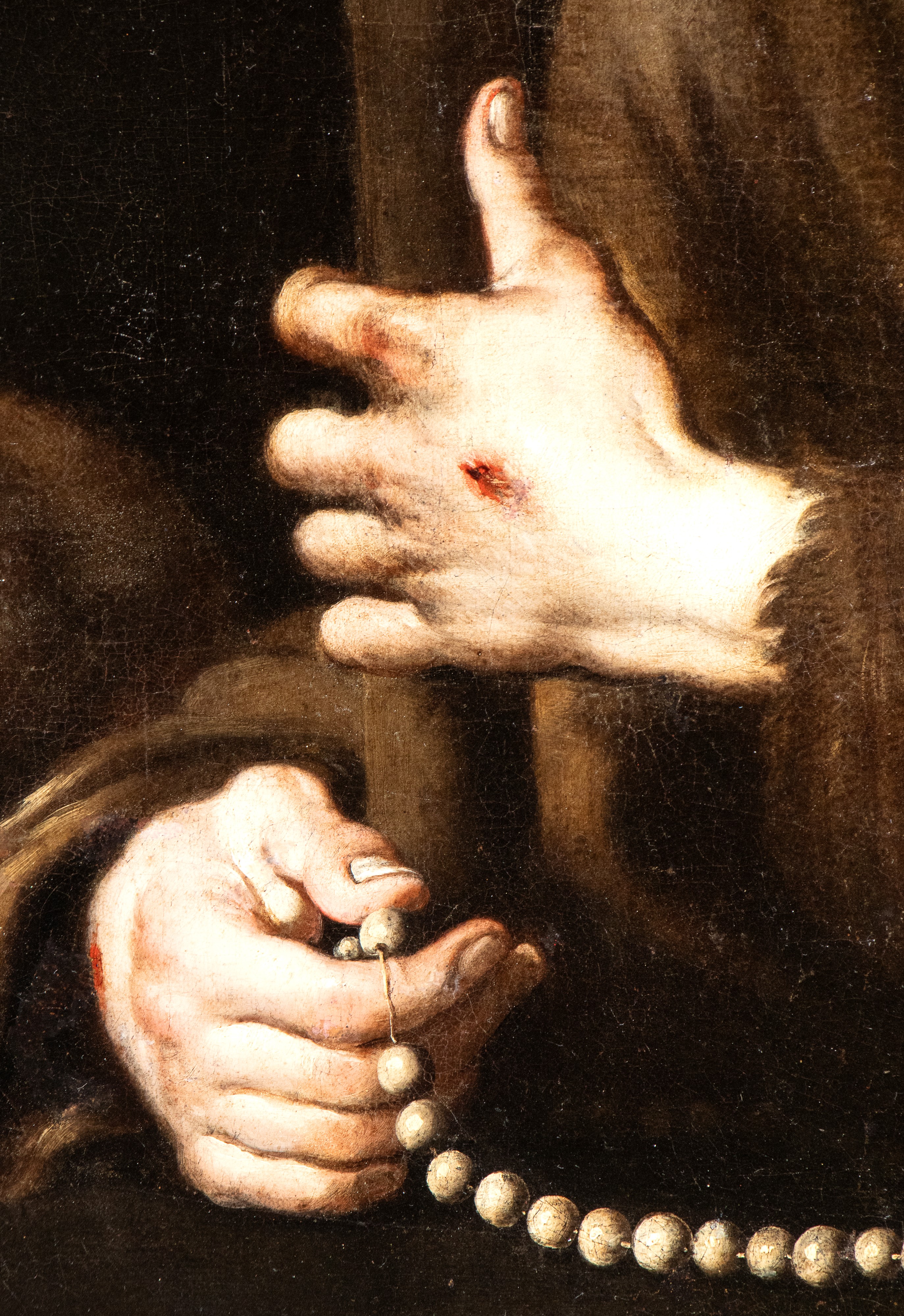 San Francesco abbracciato alla croce con teschio e rosario