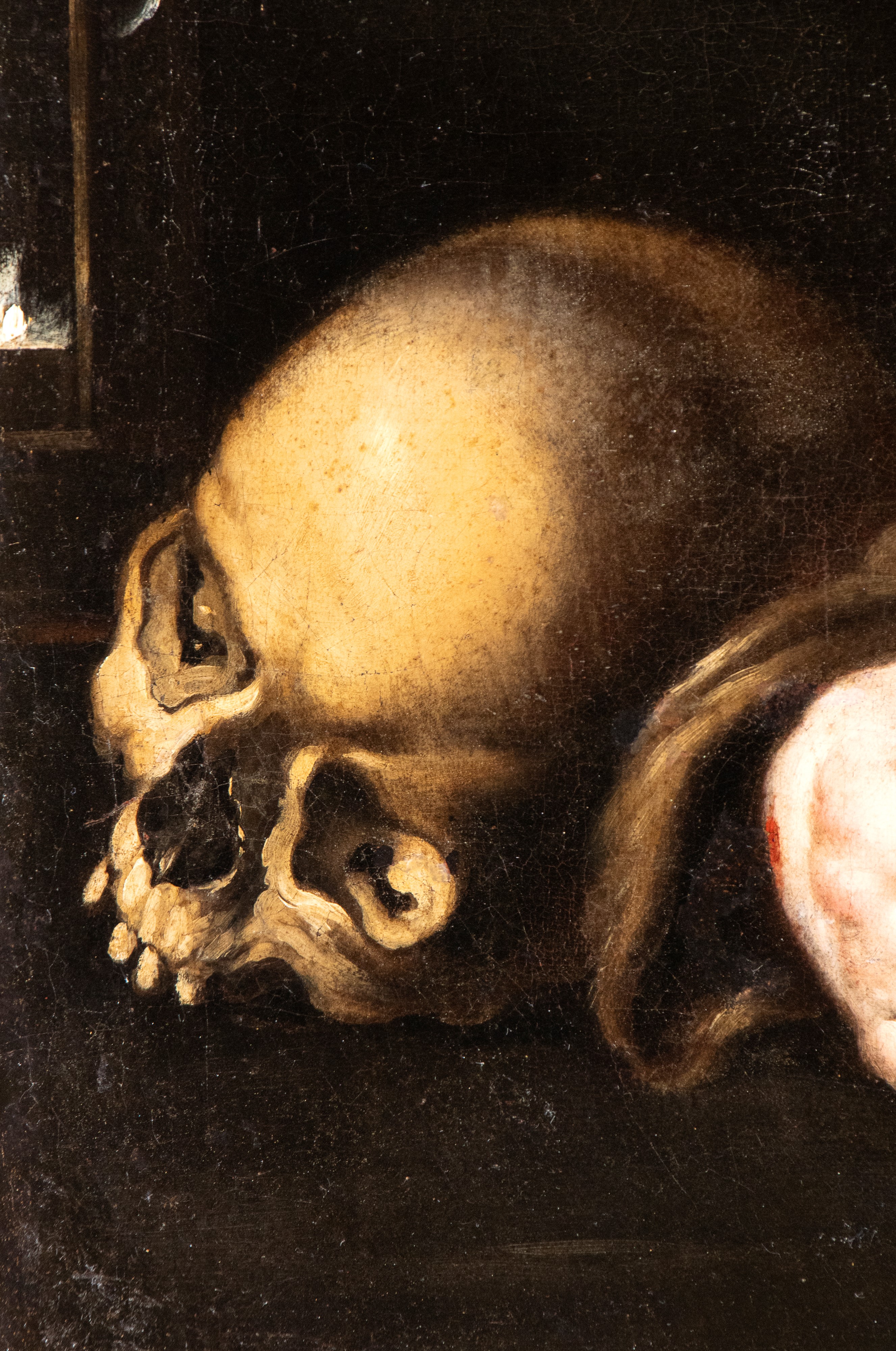 San Francesco abbracciato alla croce con teschio e rosario