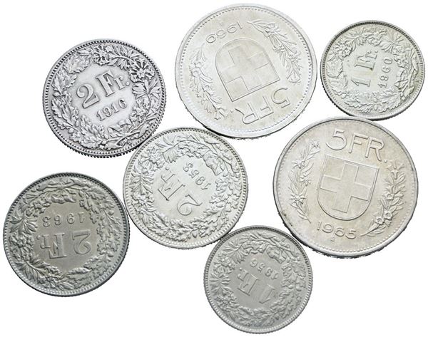 SVIZZERA. Lotto di 7 monete da 5 franchi, 2 franchi e 1 franco. Ag. Date e conservazioni varie.