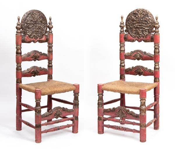 Pair of lacquered and carved wooden chairs