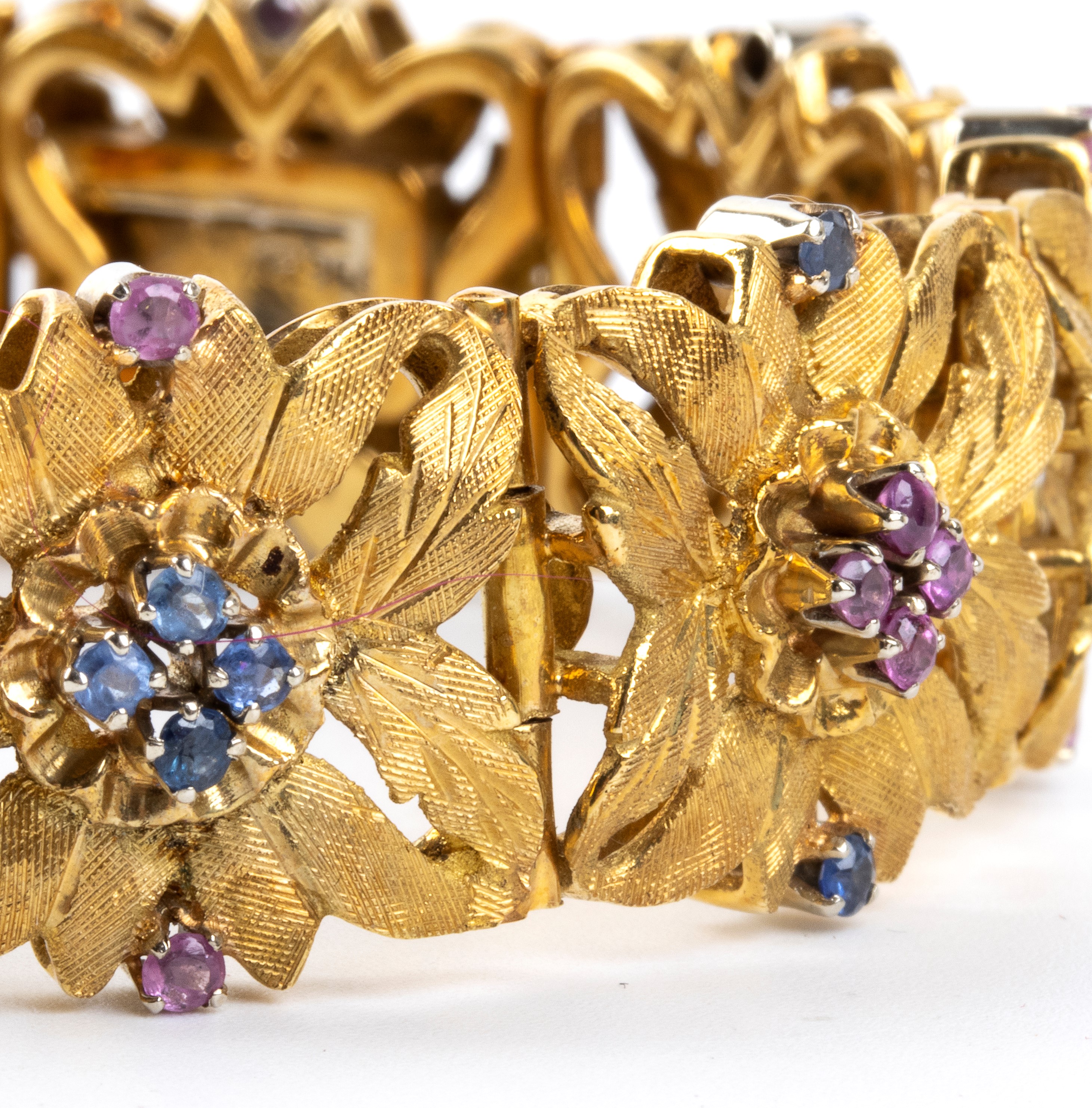 Bracciale floreale, oro 18k con rubini e zaffiri