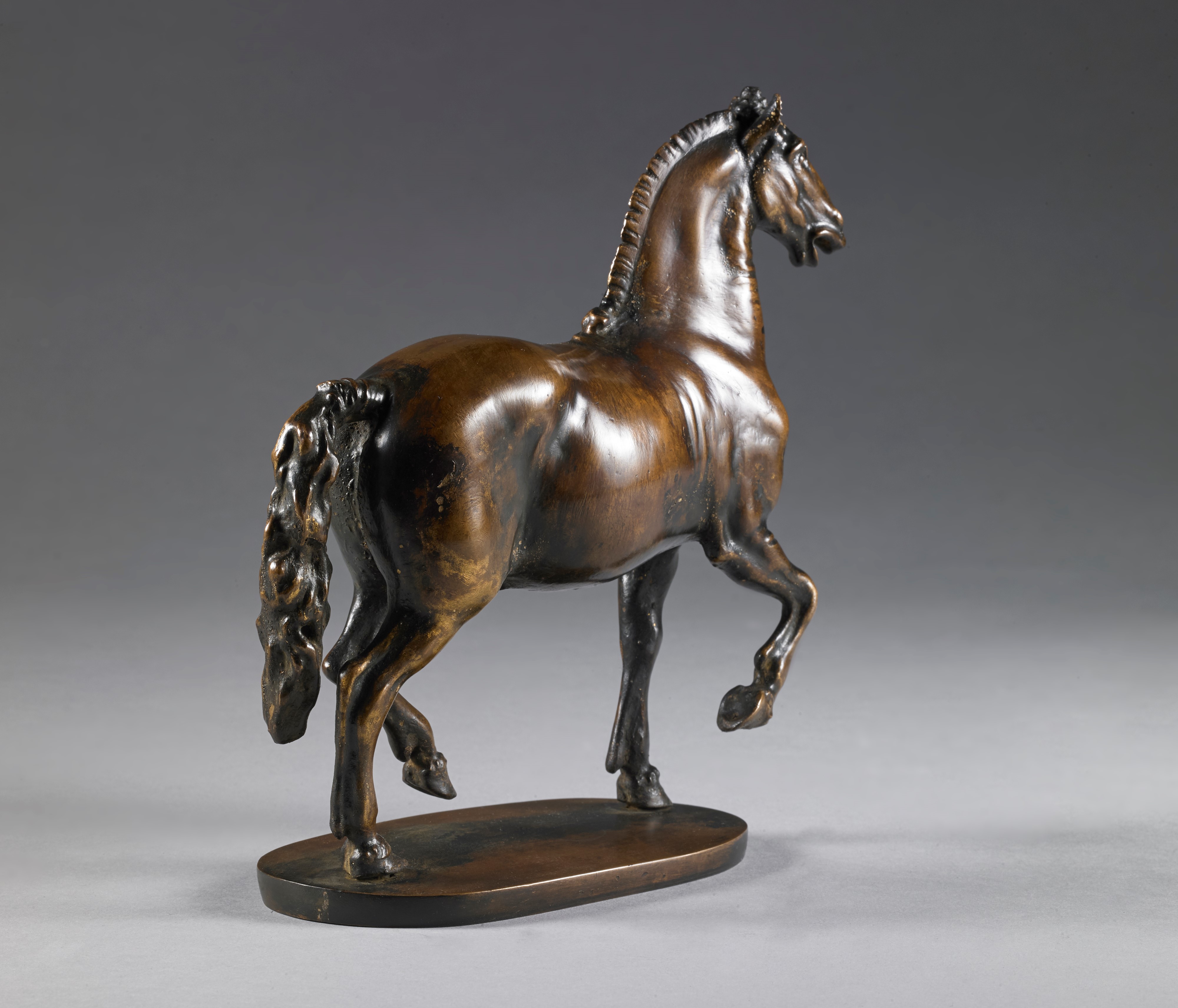 Cavallo al passo, Giambologna (Douai, 1529- Firenze, 1608) Bottega di. Bronzo, lacca rossa traspa...