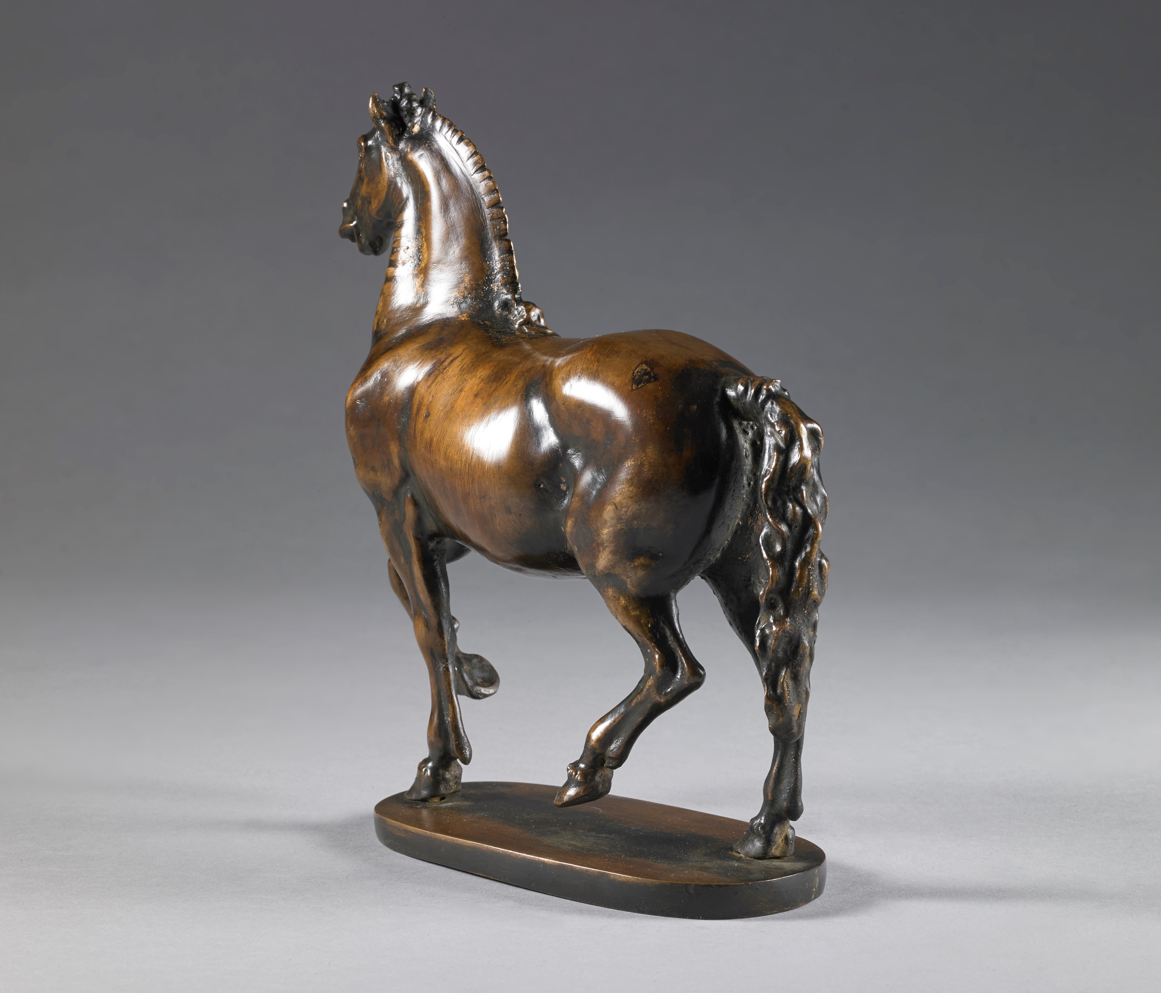 Cavallo al passo, Giambologna (Douai, 1529- Firenze, 1608) Bottega di. Bronzo, lacca rossa traspa...