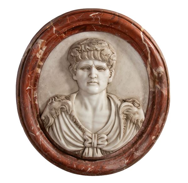 Marble clipeus featuring the profile of a Roman emperor