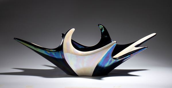 Centrotavola in ceramica e smalto