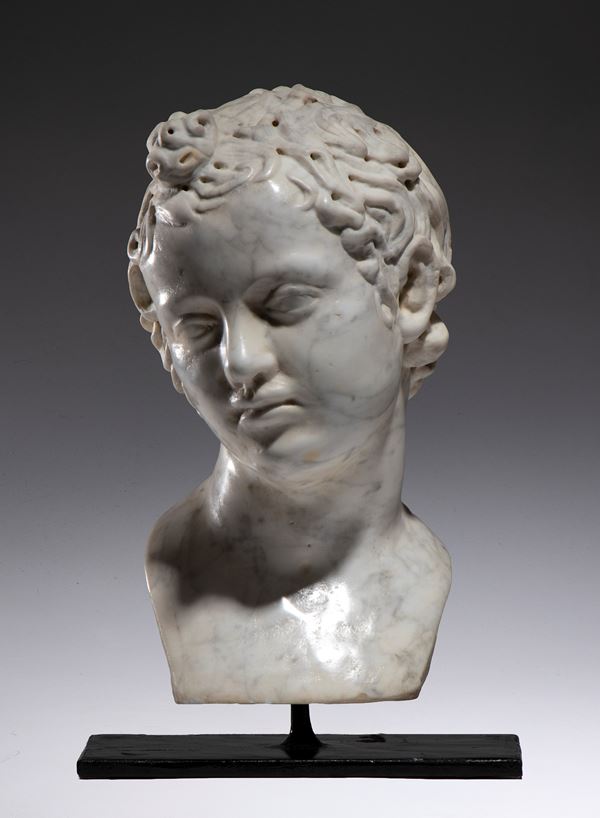 Carrara marble head depicting the Child Apollo