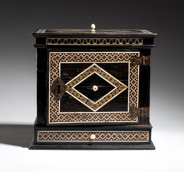 Ebony and bone coin cabinet