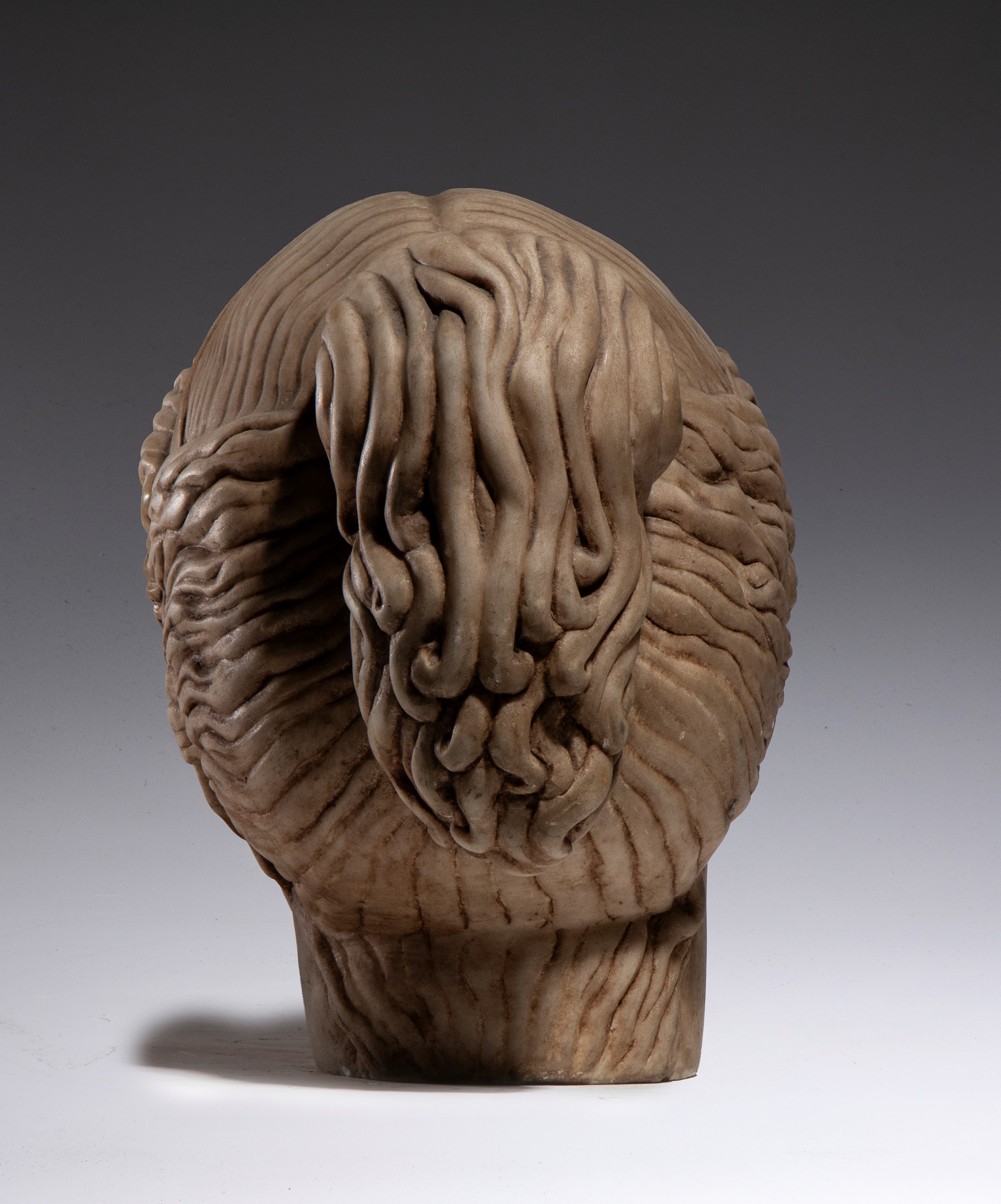 XX secolo, Testa muliebre di divinità, scultura in marmo bianco