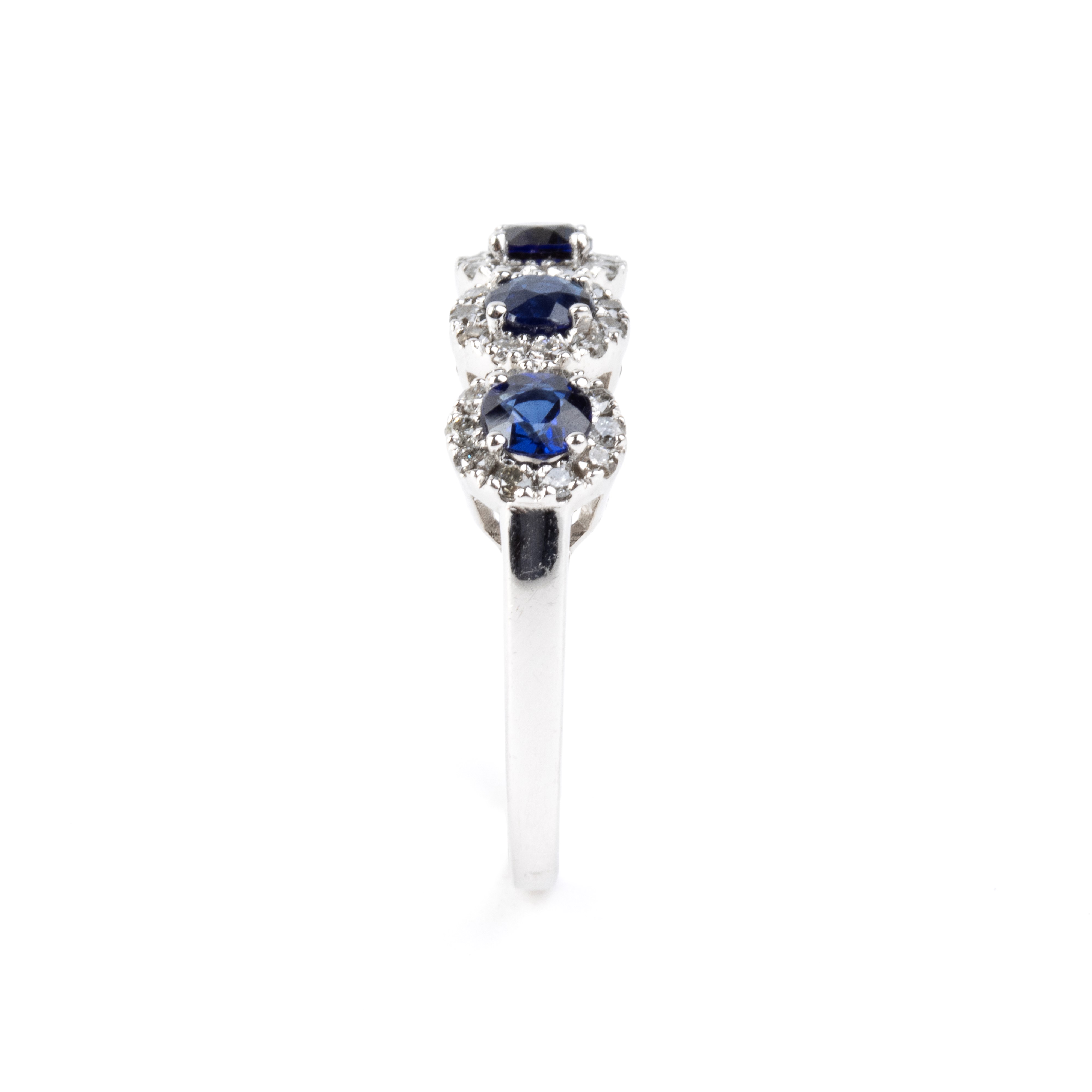 Anello in oro bianco 18k con zaffiri e diamanti