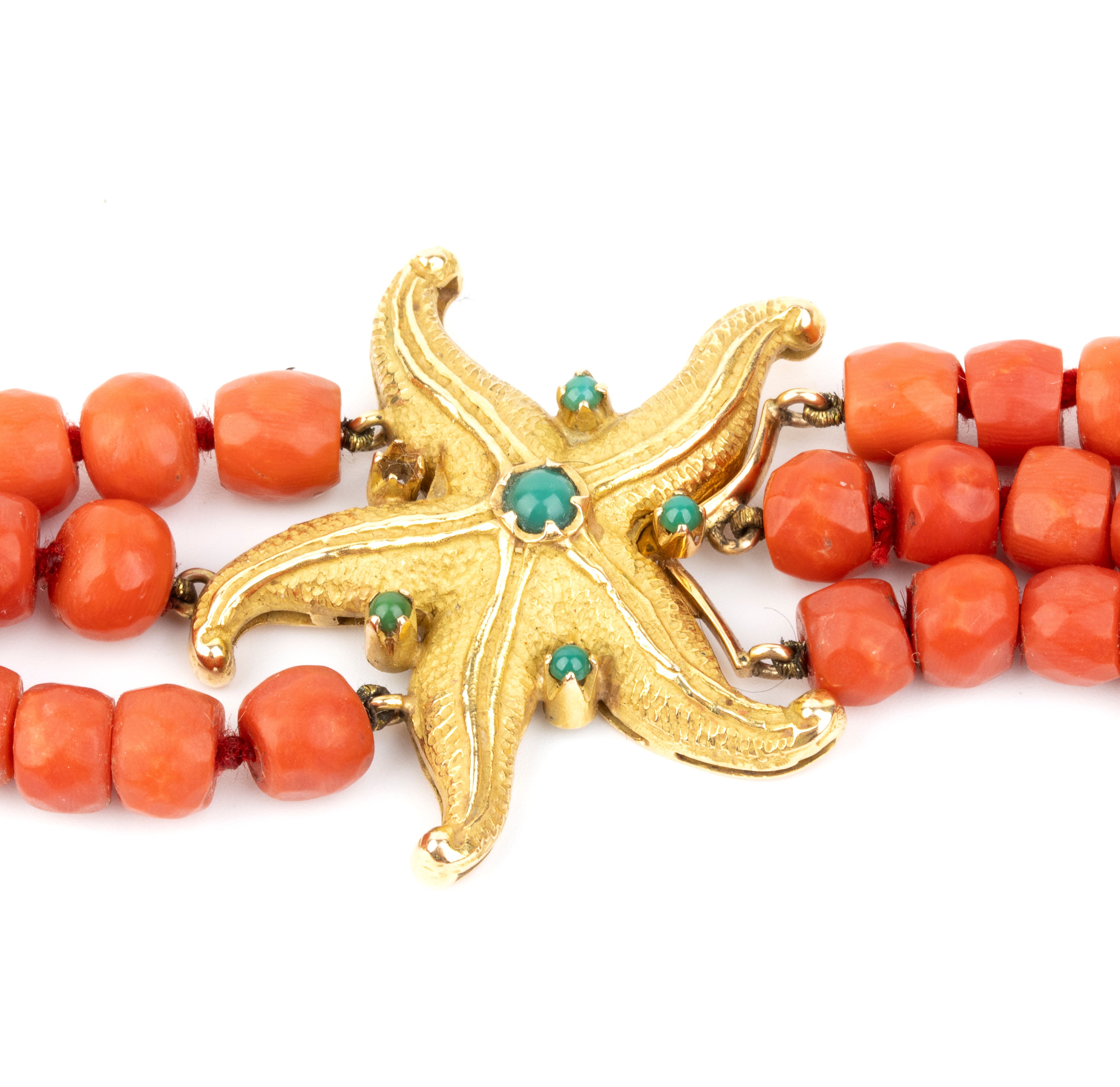 Collana in corallo Mediterraneo con stella marina in oro giallo 18k e crisoprasio