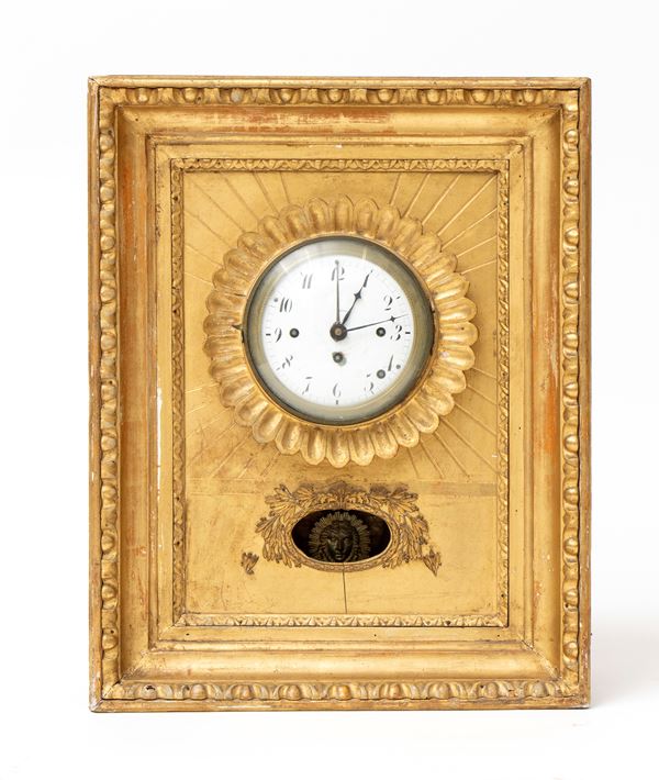 Austrian wall clock made of gilded wood