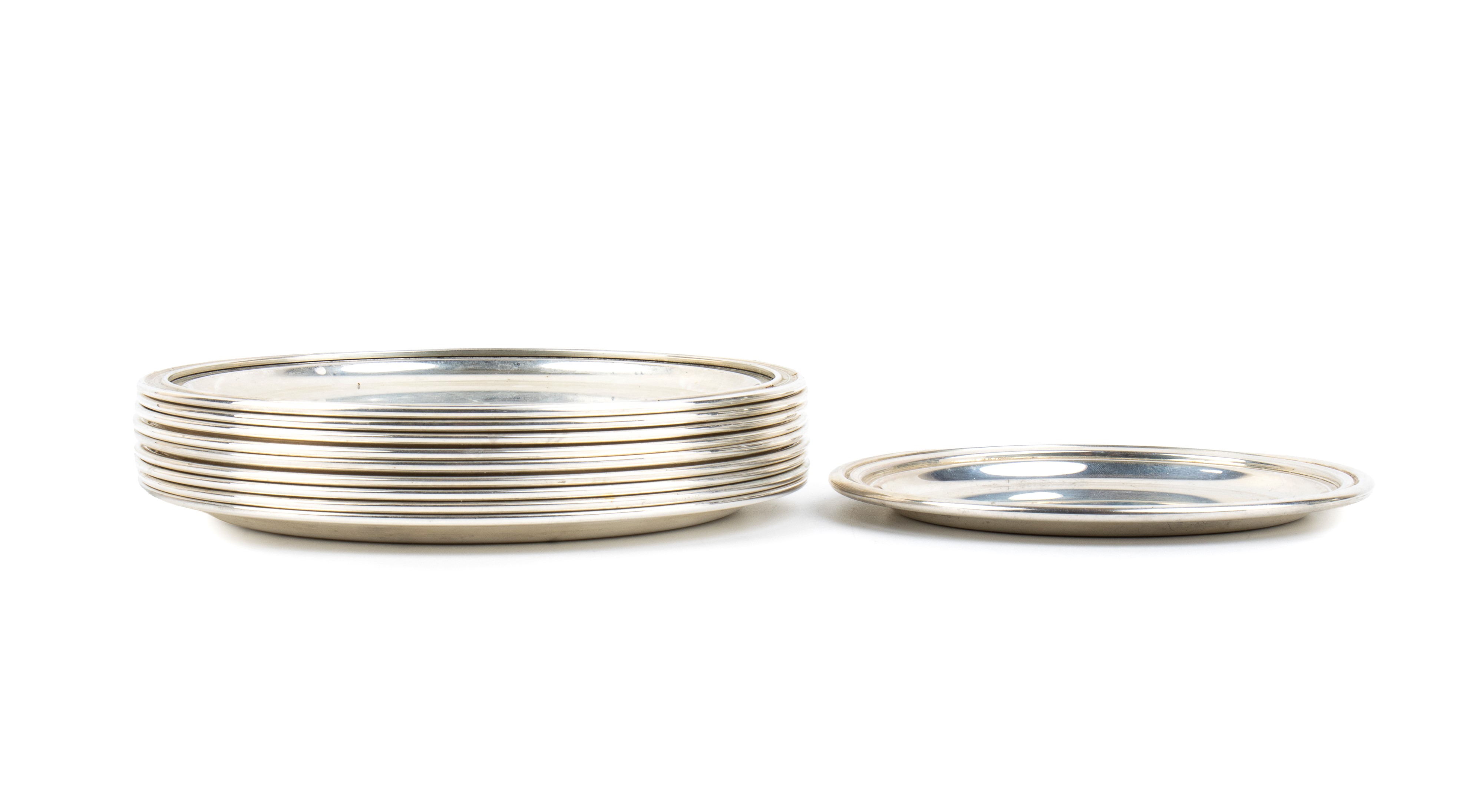 Set di 10 sottobottiglia italiani, argento 800/1000 (seconda metà XX secolo)