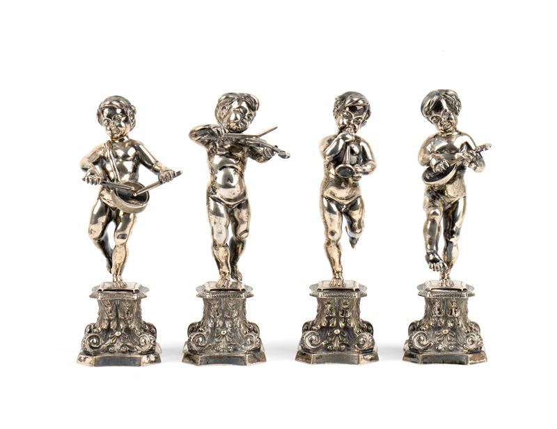 Fassi Arno - Quattro sculture italiane in argento con putti musicisti (argento 800/1000)