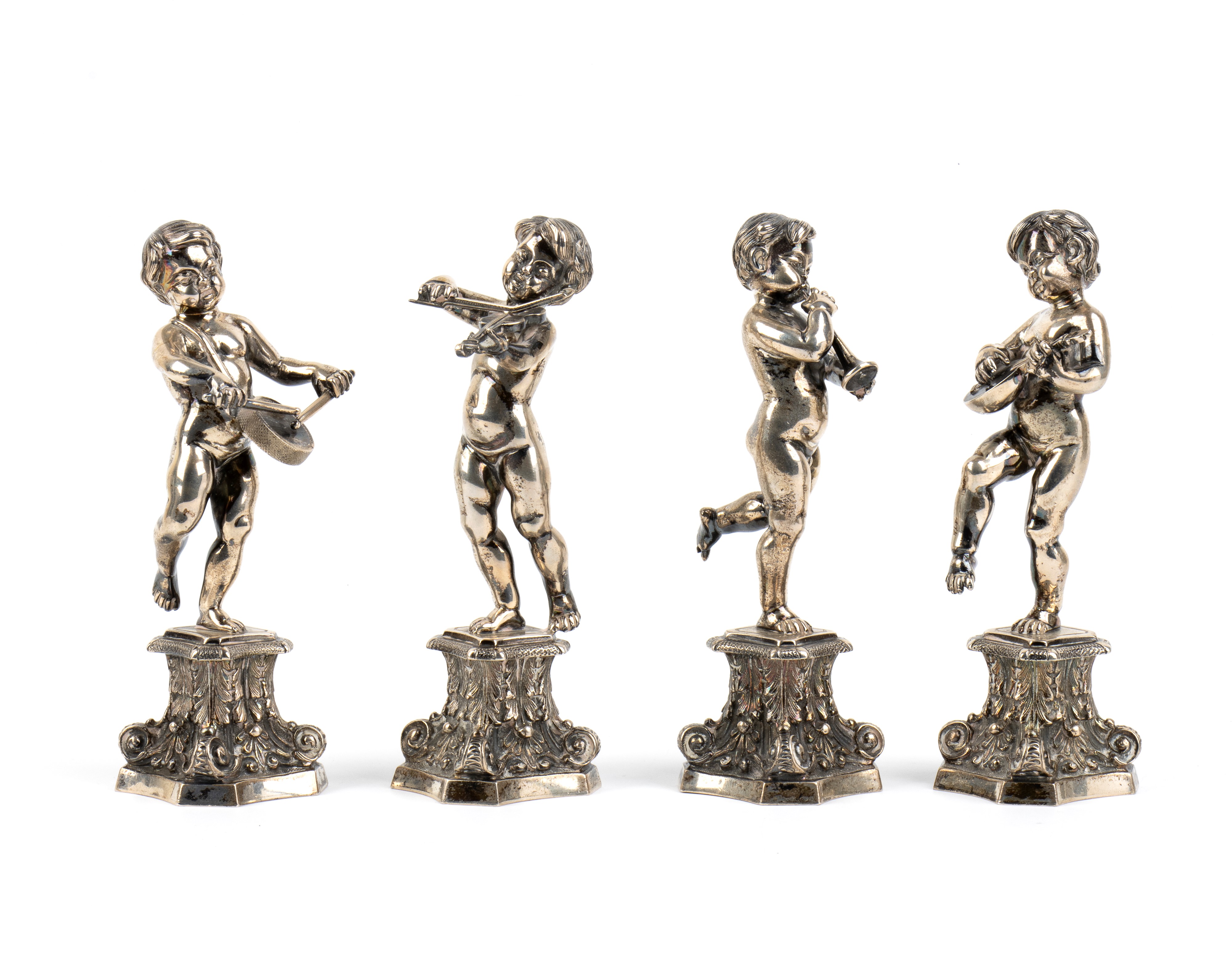 Fassi Arno - Quattro sculture italiane in argento con putti musicisti (argento 800/1000)