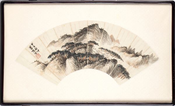 A bow-shaped fan (扇面, shànmiàn) painted with a mountain landscape in ink and traditional colors on paper. China, 20th century