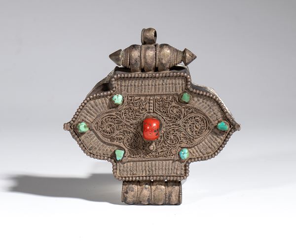 Tibetan Gau amulet holder in copper and silver with turquoise and coral inserts. Tibet, late 19th-20th century.