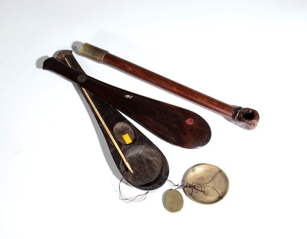 Scales and an opium pipe. China, 20th century.