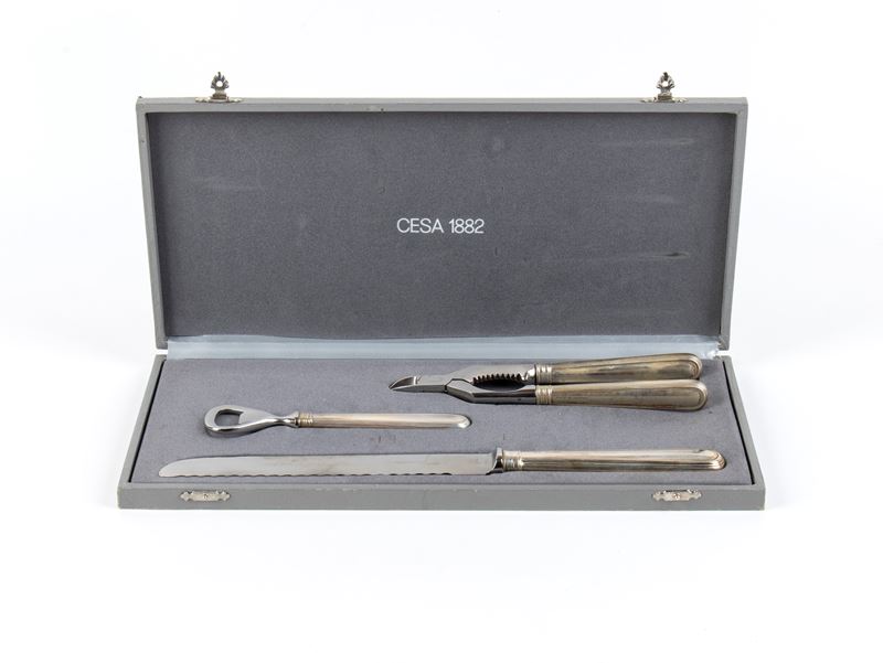 Argentiere Cesa, Servizio da tavola in argento 800/1000 con coltello da pane, cesoia e apribottig...