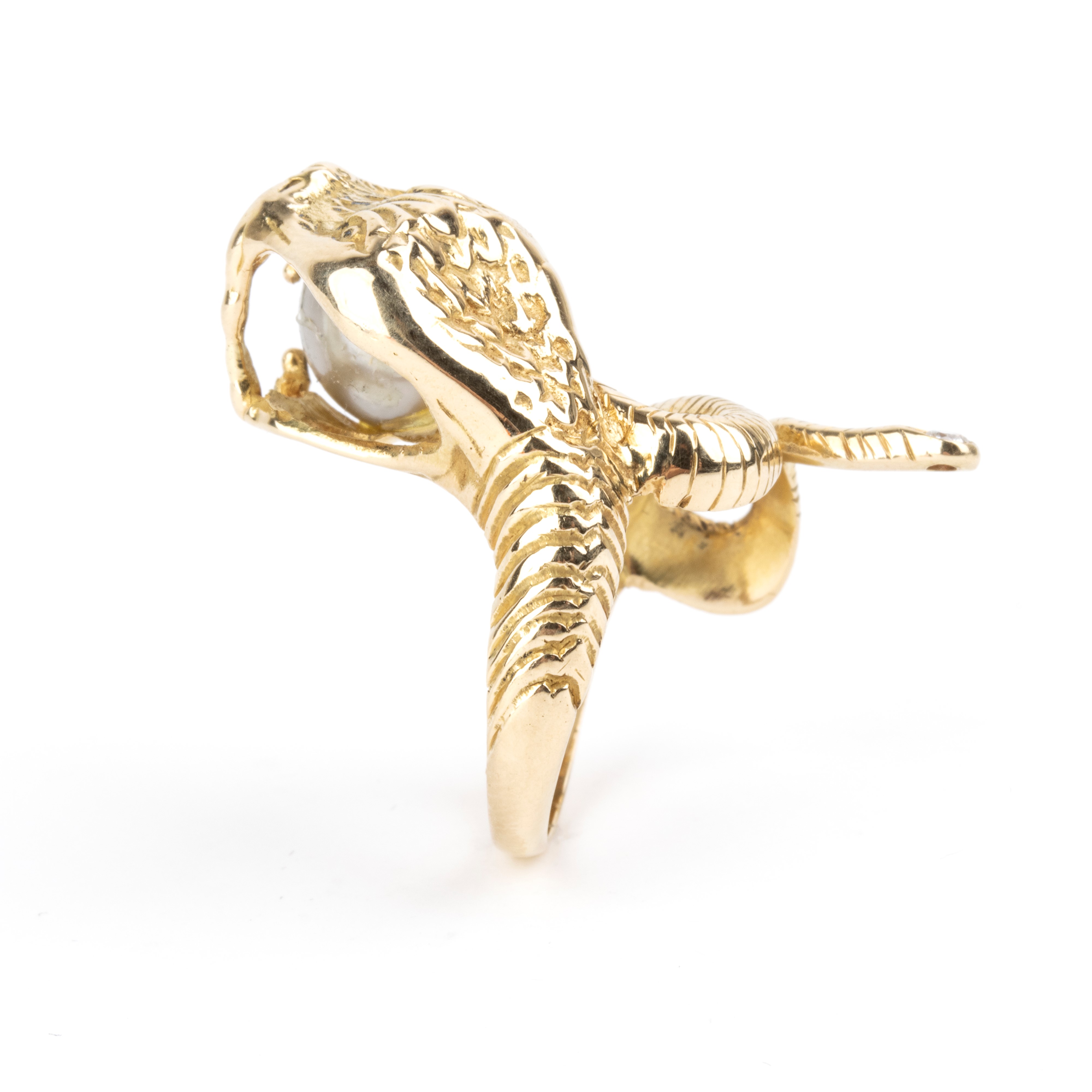 Anello, oro giallo a forma di serpente con perla Tahiti e diamante