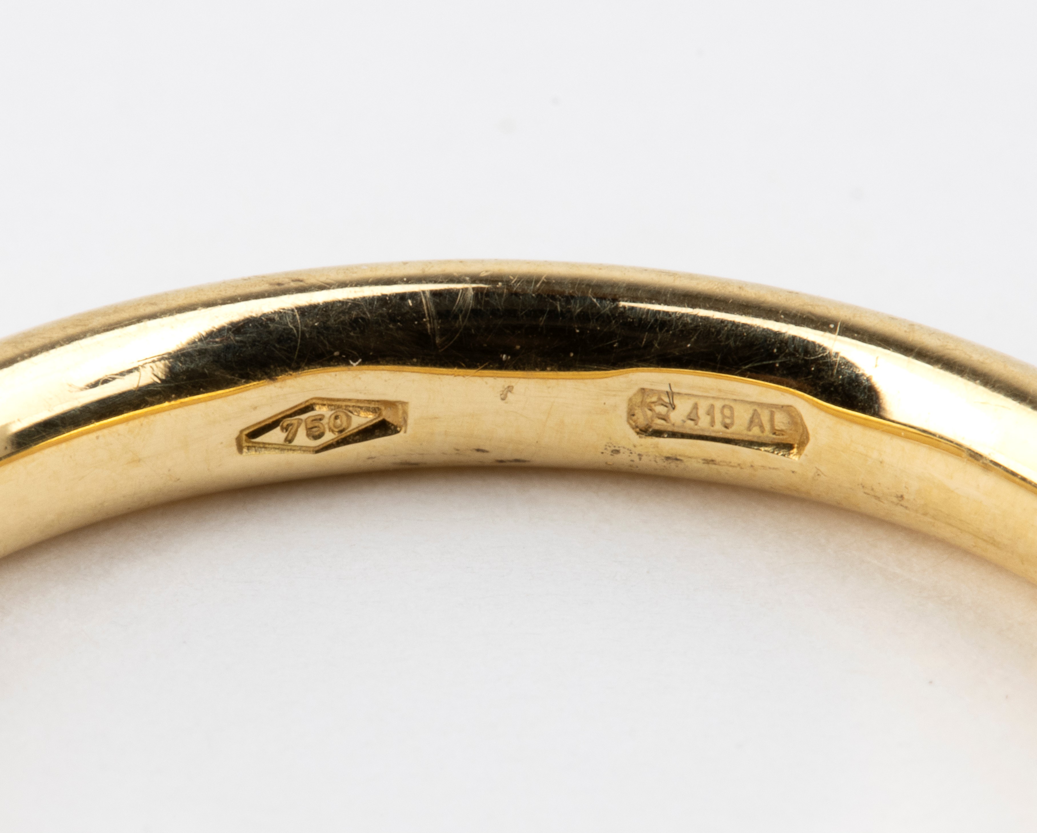 Pomellato - Collezione Lucciole: tre anelli in oro 18k con diamanti