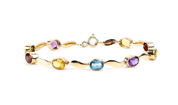 Bracciale in oro con pietre di colore  